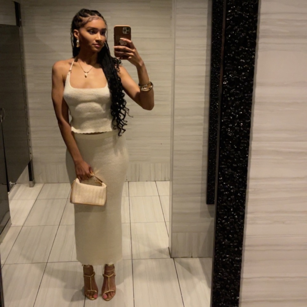 Finesse two piece set in Ivory. Worn once excellent condition.